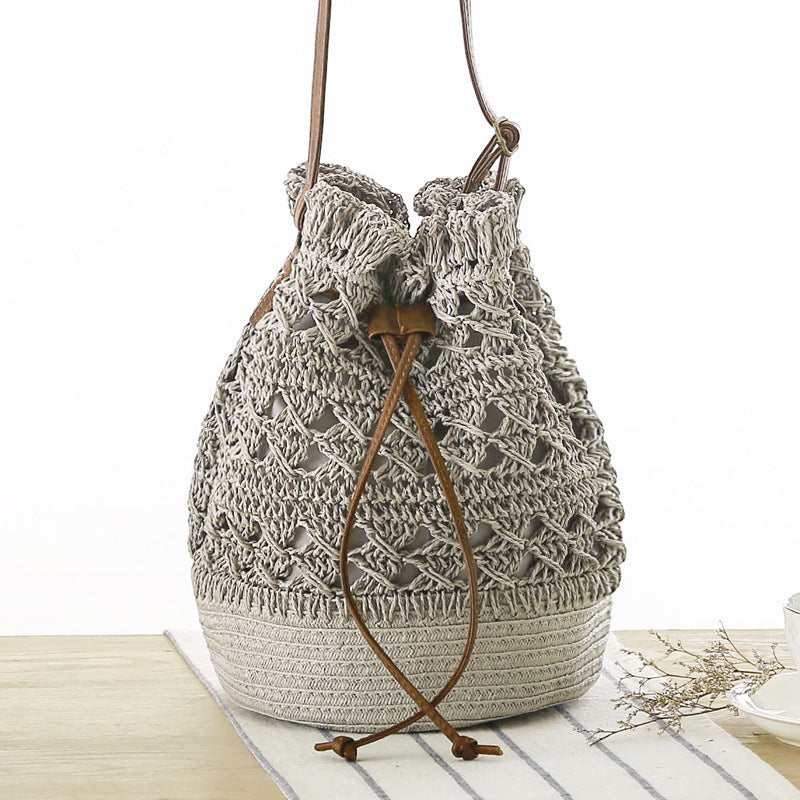 New Hollow Bucket Woven Bag Shoulder Beach Bag Seaside Vacation Straw Bag Female Bag