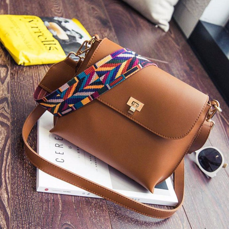 One shoulder crossbody wide shoulder strap crossbody bag